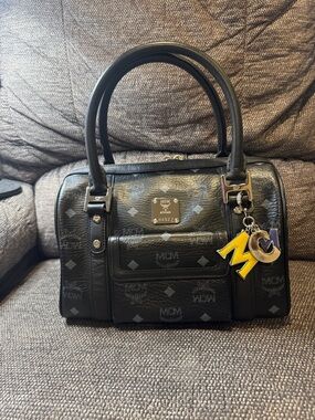 MCM Black Visetos Boston Bag with Charm